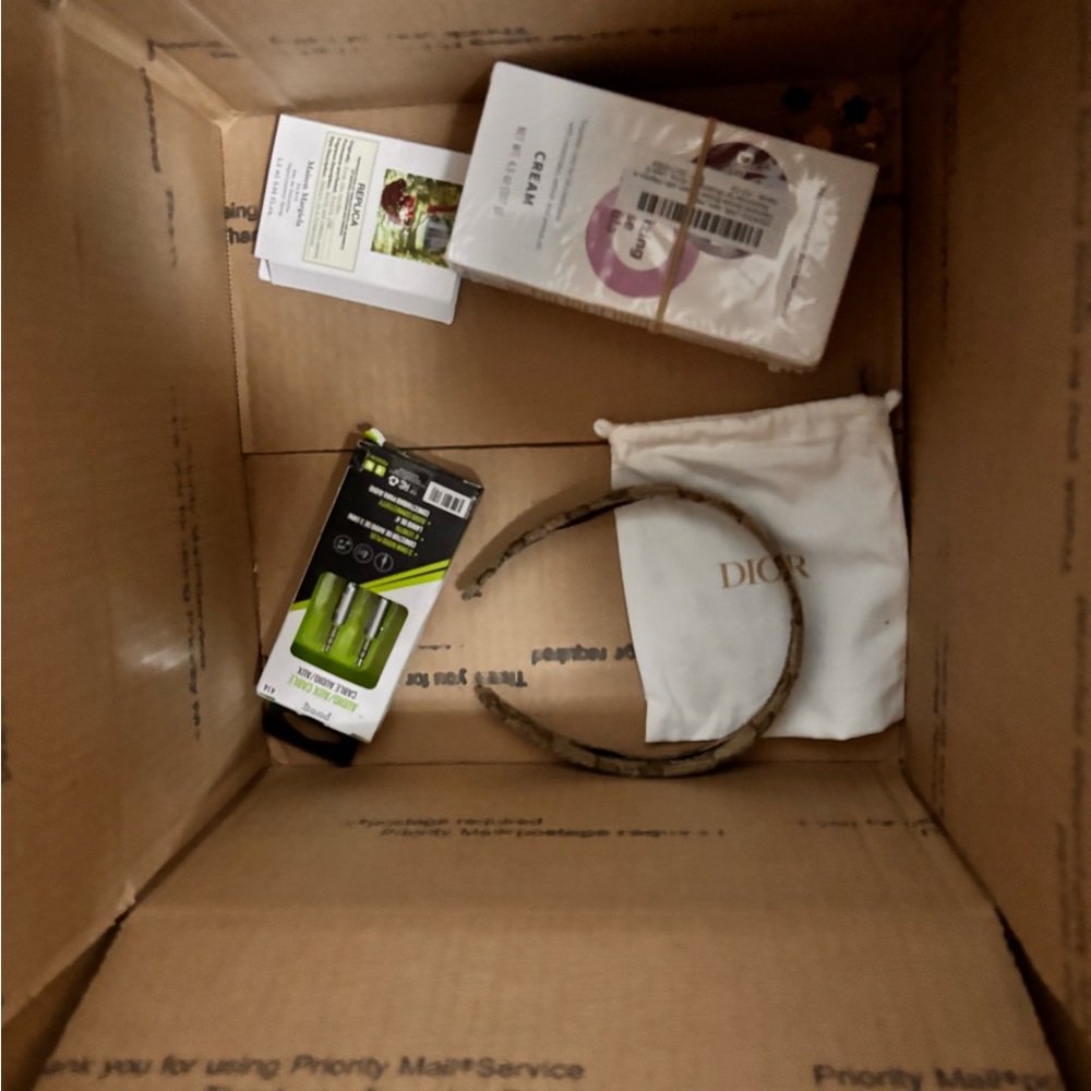 Random items I have plenty of boxes with jewelry and random items for you .